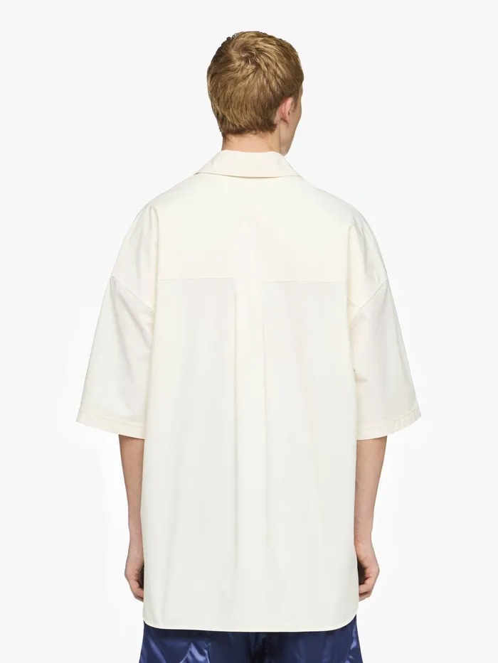 Men Tops and Shirts JW Anderson QUILTED POCKET POLO TOP Ivory Men Tops and Shirts JW Anderson QUILTED POCKET POLO TOP Ivory