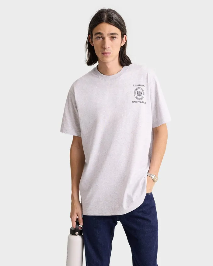 Sporty and Rich TShirts and Tops Women Crest Seal 100th T Shirt 8211 Heather GrayNavy