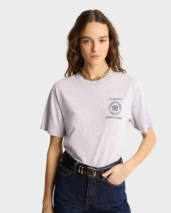 Sporty and Rich TShirts and Tops Women Crest Seal 100th T Shirt 8211 Heather GrayNavy