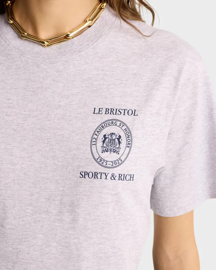 Sporty and Rich TShirts and Tops Women Crest Seal 100th T Shirt 8211 Heather GrayNavy